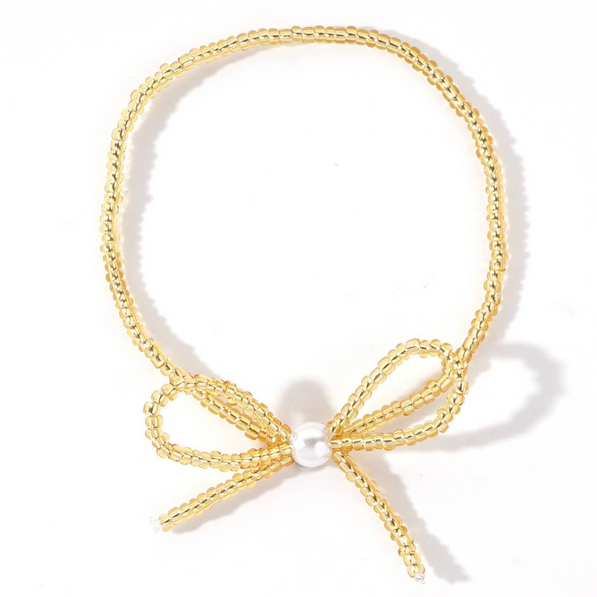 Delicate Millet Beaded Bow Bracelet